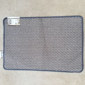 New throw mat blue trim, colors are blue, cream, tan with non-slip back 20 x30"